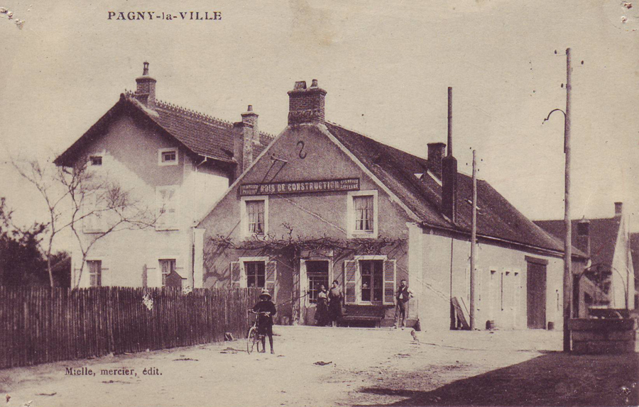 Fournisseur de bois de construction au croisement rue de l'église et rue Truchot